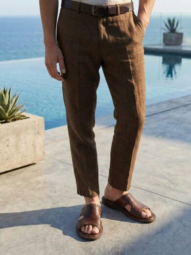 Close up detail of the stitching and leather grain on our Men's Brown Leather Slides.