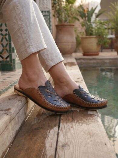 Pair of Zahra Blue Moroccan Leather Slippers showing the Berber cut-out design.